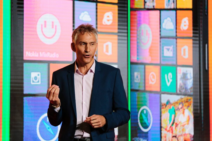 Chris Weber, CVP, Mobile Devices Sales of Microsoft  presents new products during his keynote speech at a Microsoft Nokia presentation event at the consumer electronic fair IFA in Berlin, Thursday, Sept. 4, 2014. (AP Photo/Markus Schreiber)